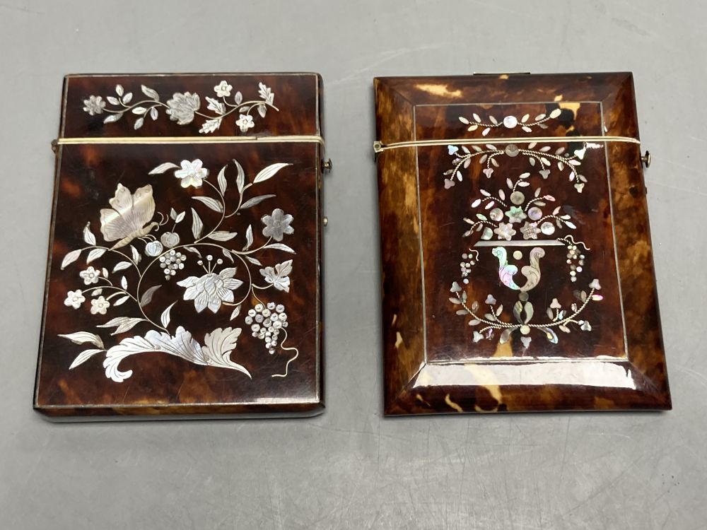 Two 19th century tortoiseshell and mother-of-pearl card cases, largest 10cm